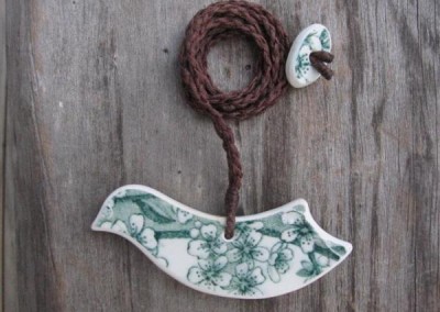 China carved bird pendant,with on plaited cord. This china is historic - from the 1800s $72 China available changes all the time...some of these patterns may no longer be in stock but a similar design can be provided.