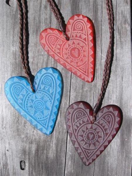 Engraved glass heart pendants with adjustable cord $88 TURQUOISE BLUE; ORANGE; DARK RED Colours available - amber, orange, light red, dark red, pale green, lime green, mid-green, dark green, moss green, aqua green, turquoise blue, sapphire blue, teal blue, cobalt/dark blue, pale lavender, purple