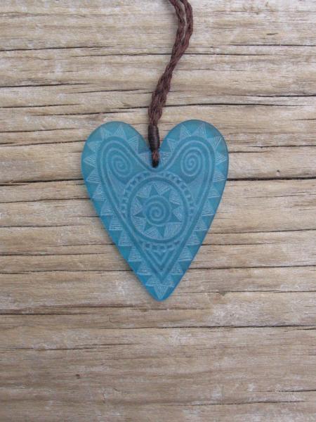 Engraved glass heart pendant on adjustable cord $88 TURQUOISE BLUE Colours available - amber, orange, light red, dark red, pale green, lime green, mid-green, dark green, moss green, aqua green, turquoise blue, sapphire blue, teal blue, cobalt/dark blue, pale lavender, purple