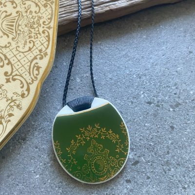 Recycled ceramic round pendant - gold filagree on dark green $64