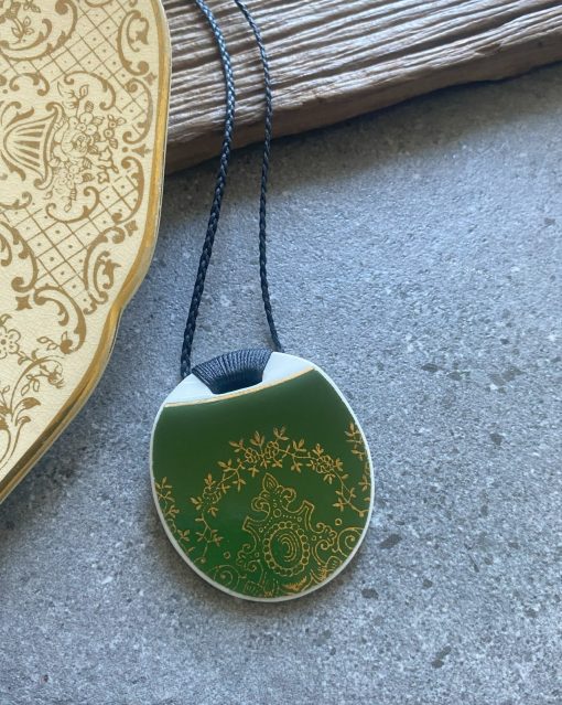 Recycled ceramic round pendant - gold filagree on dark green $64