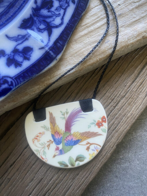 Recycled-ceramic-semi-circle-pendant-magical-bird $68